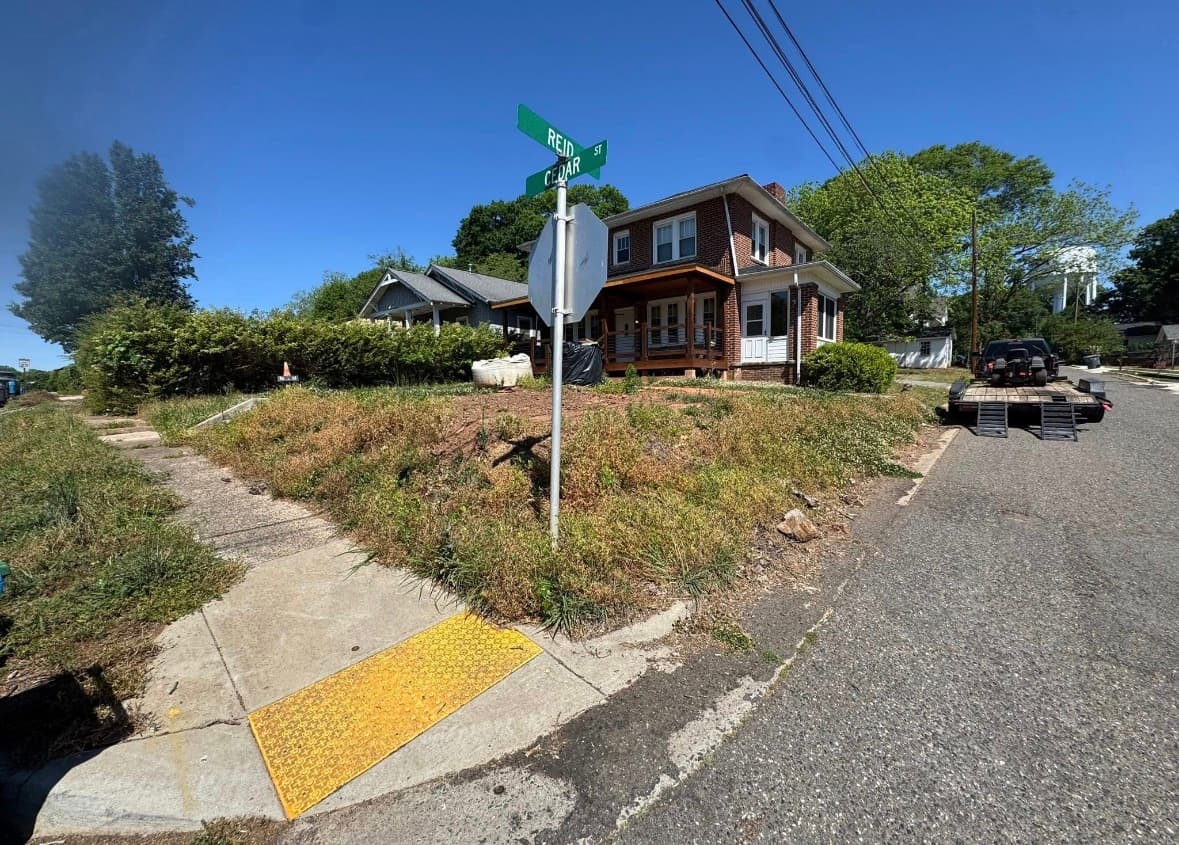 Overgrown property before clearing